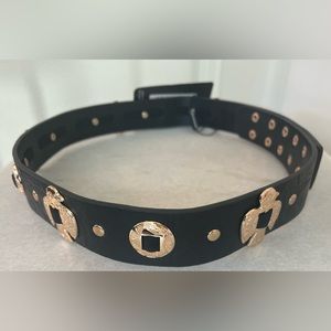 PrettyLittleThing.com Black leather belt with gold tone detailing all around.